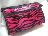 Necessaire zebra rosa.